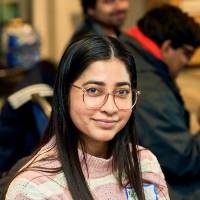 International Anchor Allies Winter 2026 First Mixer - a lady in glass pose for picture